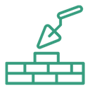 Symbole d'une truelle au dessus d'un mur de brique en construction